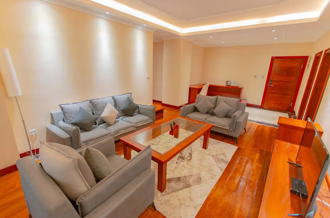 The deluxe three-bedroomed apartment with 128 sqm, offers a modern comfy separate living area and 3 elegant guestrooms each with a king bed, two bathrooms, a private kitchen, and three exclusive magnificent balconies.